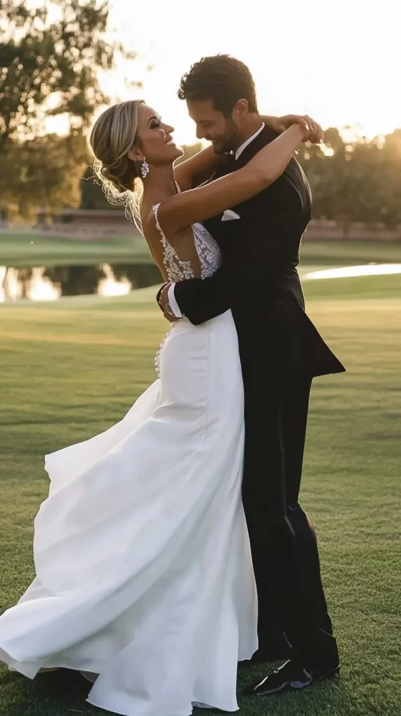 dancing in the grass photo of bride and groom