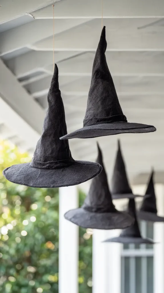 witch hats hanging from fishing line
