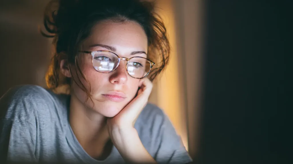 woman looking at computer
