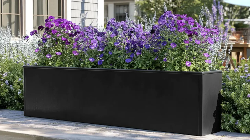 black planter box with purple plants