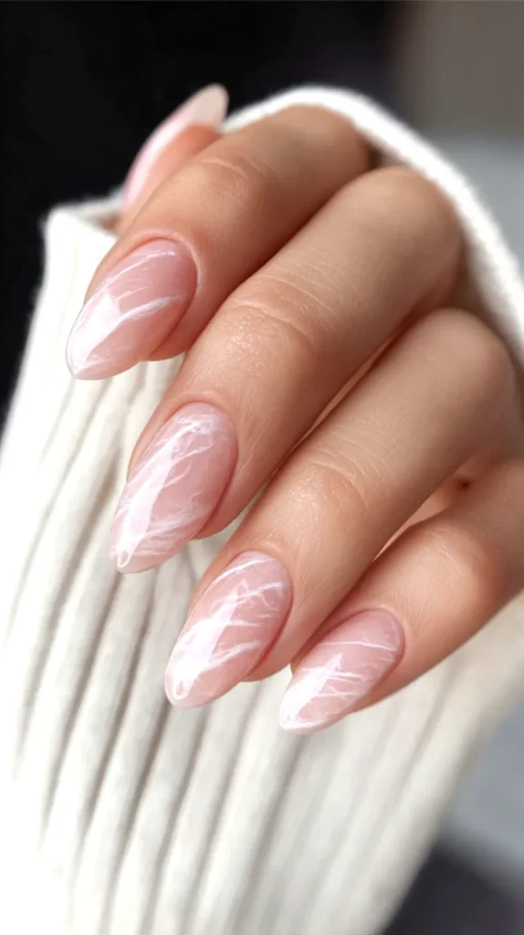 white and light pink marble manicure