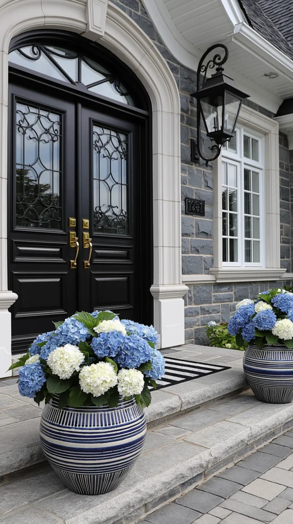 summer front porch with neatly placed flower pots next to the front door